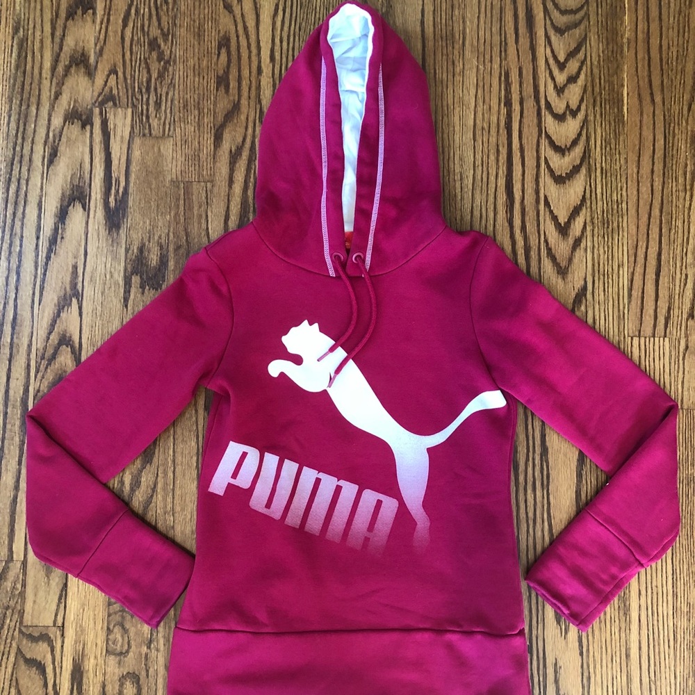 I am selling a pink and white Puma hoodie!!